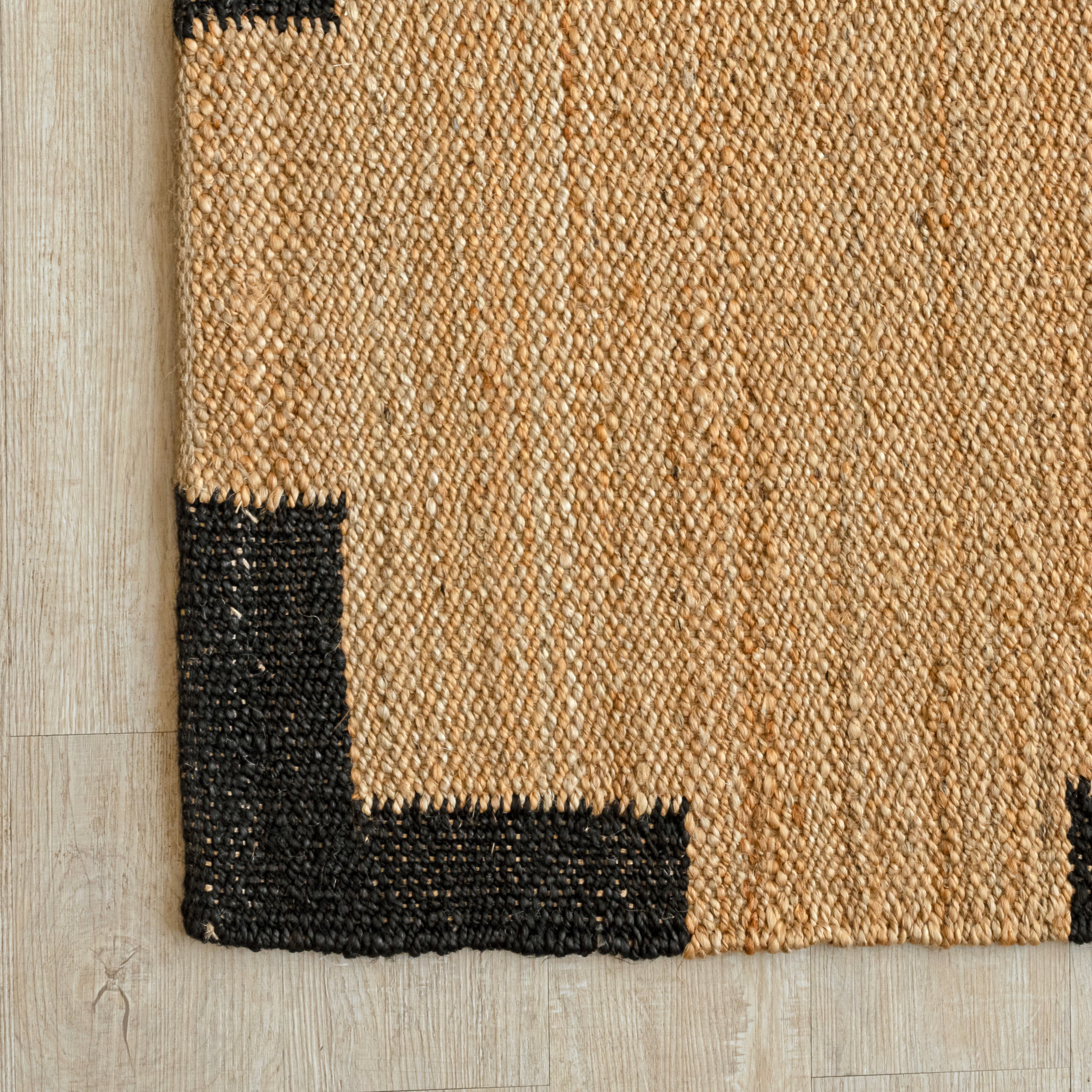 Handcrafted Natural Hemp Rug with Bold Black Accents - Modern Minimalist Design