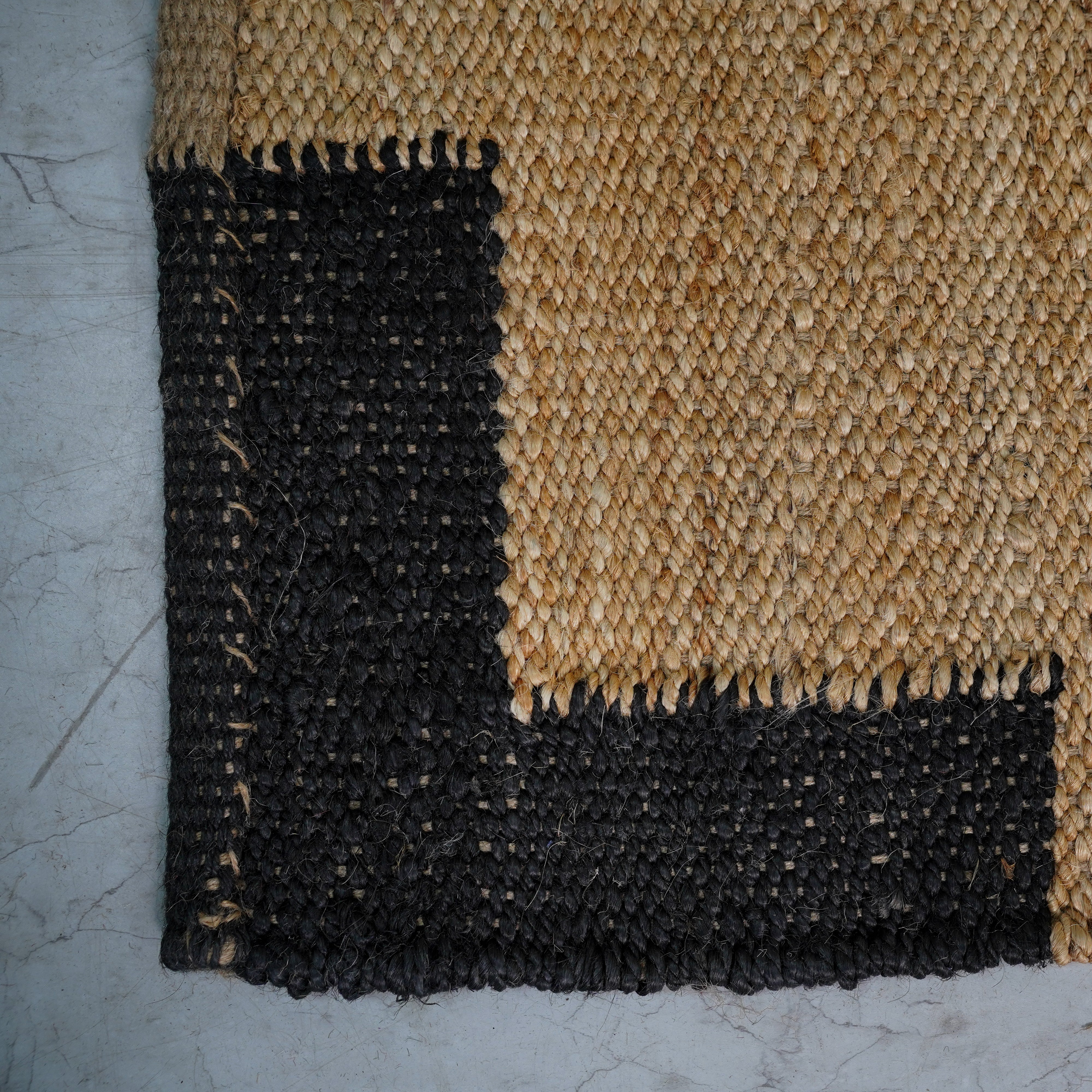 Natural Handwoven Hemp Rug with Black Corner Accents – Rustic Charm for Modern Spaces