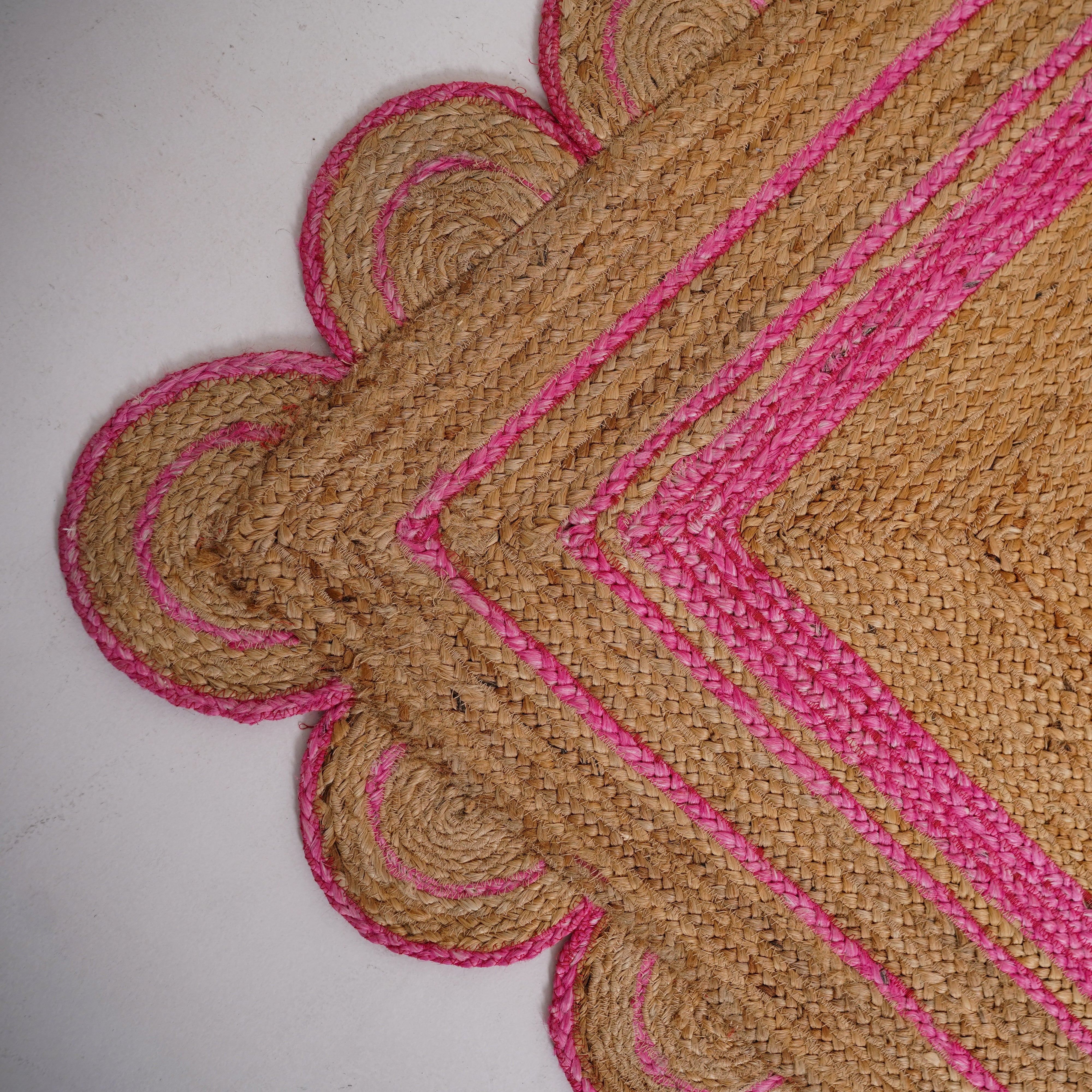 Hand braided 100% Hemp Scalloped Edge Rug with Vibrant Pink Accent