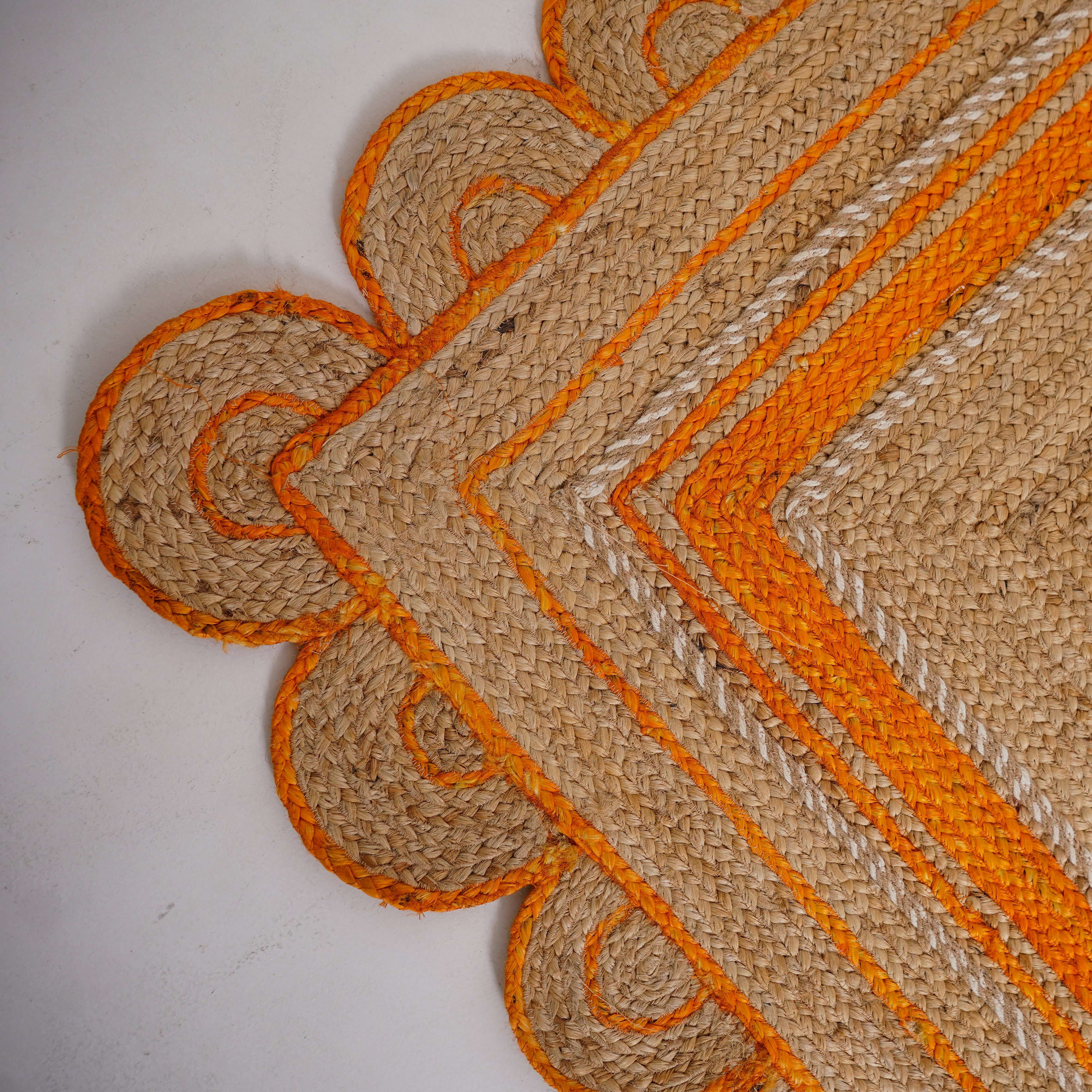 Handcrafted Scalloped Hemp Rug with Vibrant Orange Trim – Natural Elegance