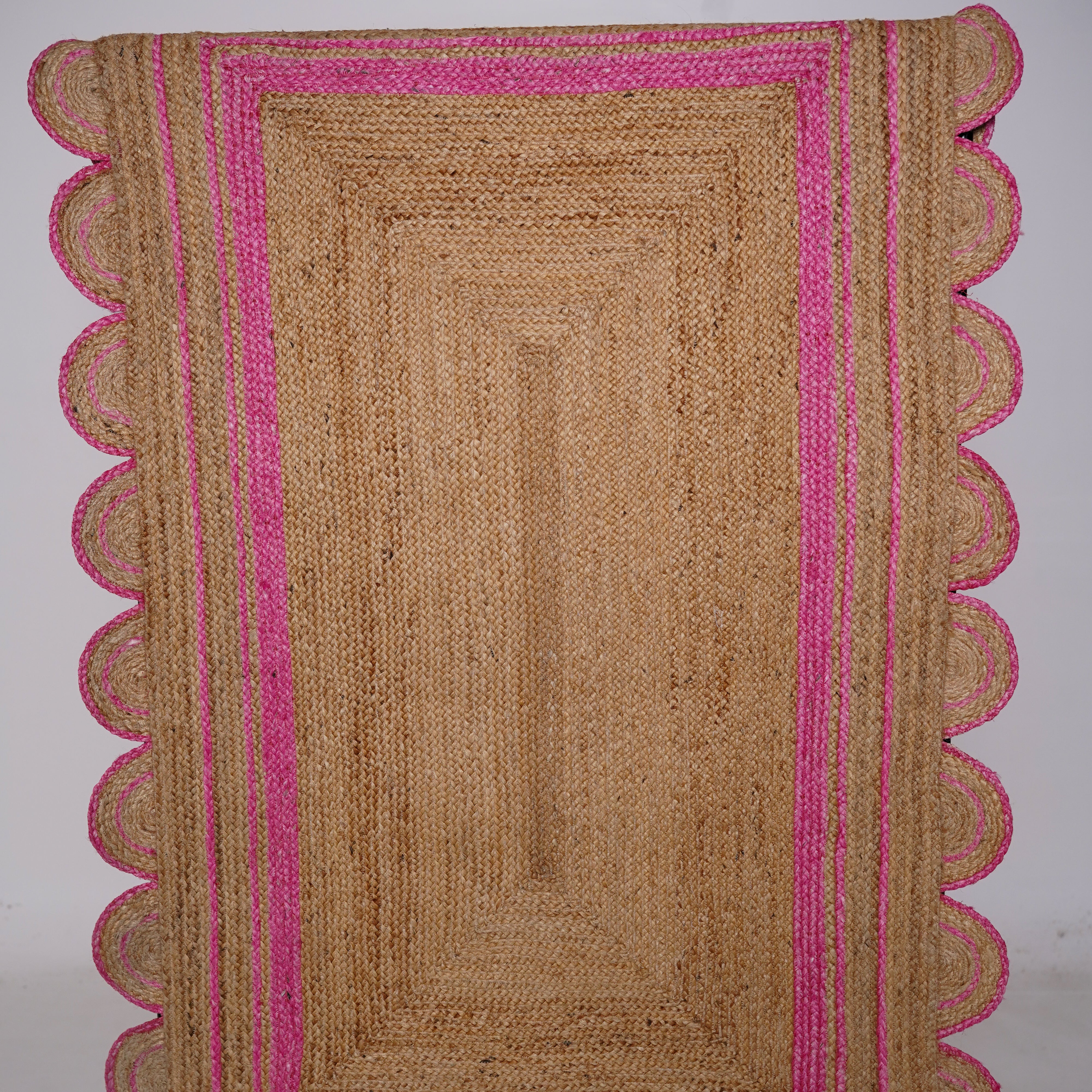 Hand braided 100% Hemp Scalloped Edge Rug with Vibrant Pink Accent