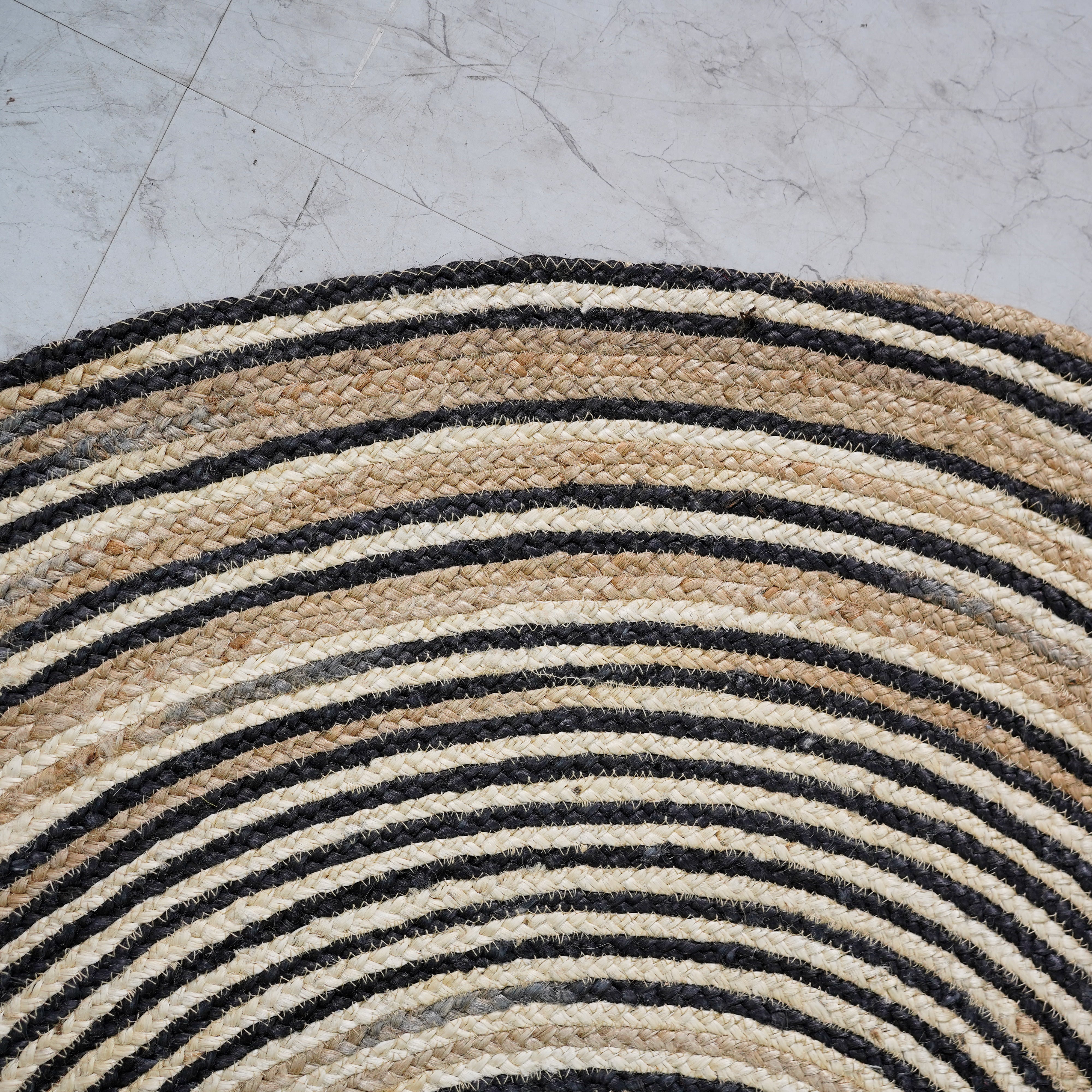 Natural Hand-Braided Hemp Round Rug with Black Spiral Accents – Eco-Friendly, Artisan Crafted