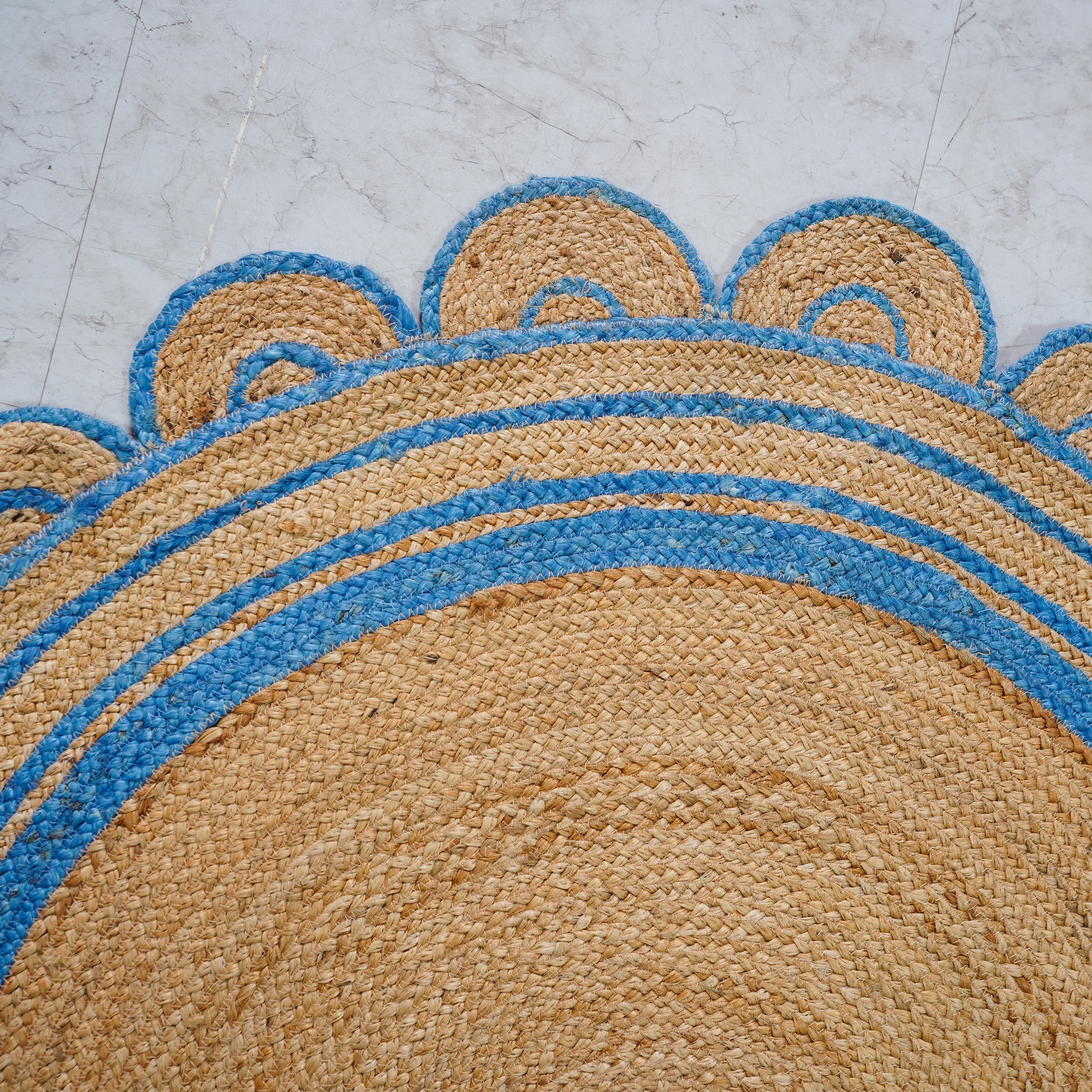 Handcrafted Round Hemp Rug with Scalloped Edge in Blue Accents